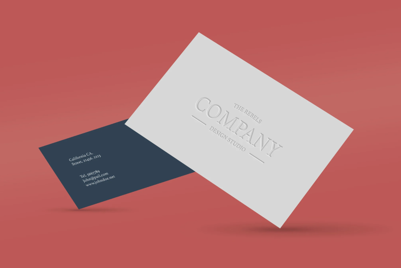 Business card with embossing of a company logo.